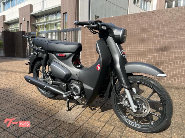 ホンダ スーパーカブＣ１２５ 新車 ２０２３年モデル ＡＢＳ ブラックスタイル ダブルシート 延長リアキャリア マット アクシスグレー｜モト・ウイング・須賀｜新車・中古バイクなら【グーバイク】