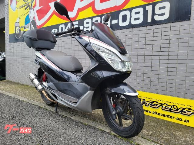 ホンダ 社外マフラ－ PCX125 JF56似ついていました、 日本初のPCX 2本出し