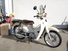 ホンダ　スーパーカブ１１０　令和７年１月登録　キャストホイール　センターキャリアー　グリップヒーター　風防　ＵＳＢ２口　サイドバックガード