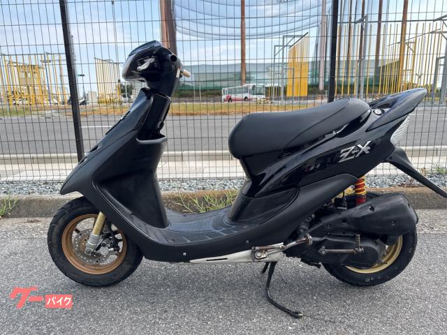 ホンダ ライブDio ZXバッテリー外装新品デイトナサス